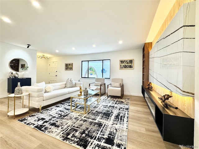 4192 S Vrain St, Denver, CO 80236 - living room with light wood finished floors and recessed lighting