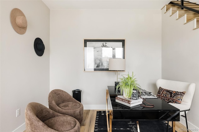 office with baseboards and wood finished floors