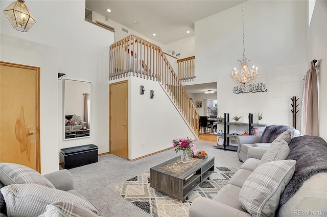 living room with light carpet, a high ceiling, and a notable chandelier