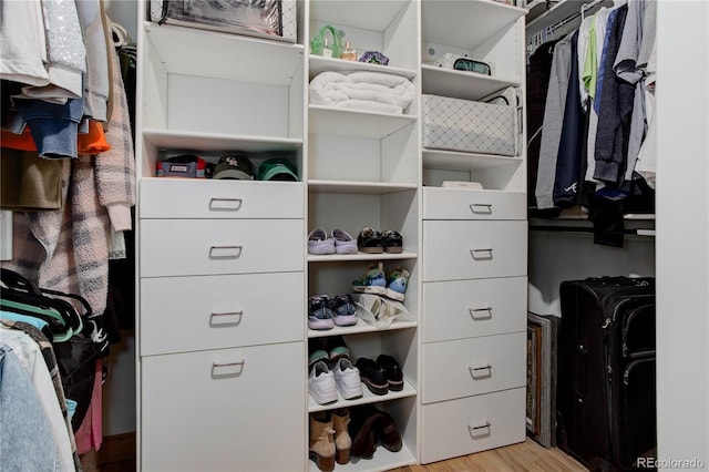 walk in closet featuring light wood-type flooring