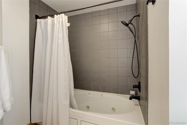 full bath with a combined bath / shower with jetted tub