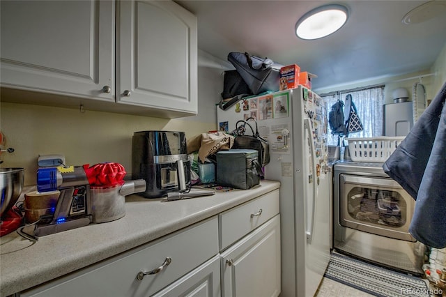 laundry room with washer / clothes dryer and laundry area