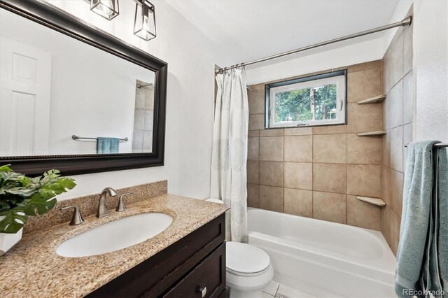 9189 Fallen Rock Rd, Conifer, CO 80433 - full bath featuring vanity and shower / tub combo