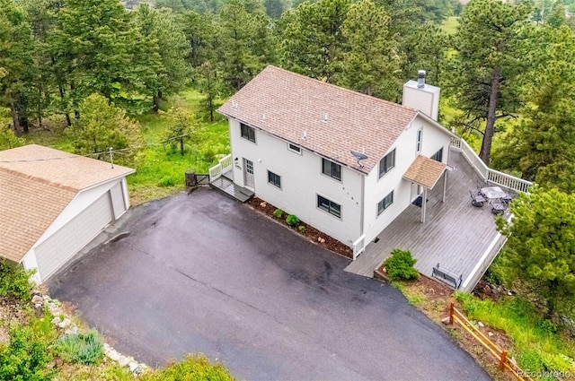 9189 Fallen Rock Rd, Conifer, CO 80433 - view of subject property with a forest