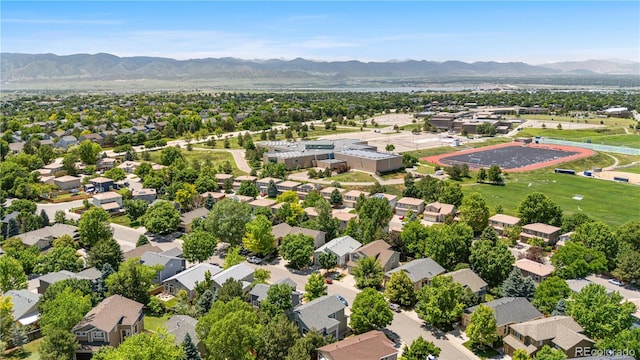 10262 Spotted Owl Ave, Highlands Ranch, CO 80129 - aerial perspective of suburban area featuring a mountainous background