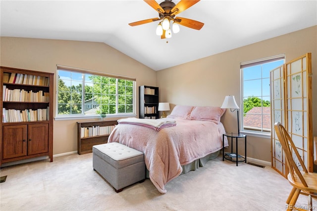 10262 Spotted Owl Ave, Highlands Ranch, CO 80129 - bedroom featuring vaulted ceiling, light colored carpet, and a ceiling fan