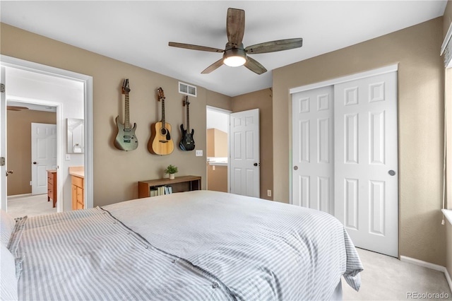 10262 Spotted Owl Ave, Highlands Ranch, CO 80129 - bedroom featuring light colored carpet, a closet, a ceiling fan, and ensuite bath