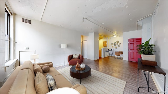 444 17th St Unit 301, Denver, CO 80202 - living area with wood finished floors and baseboards