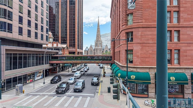 444 17th St Unit 301, Denver, CO 80202 - view of building exterior with uncovered parking and a view of city