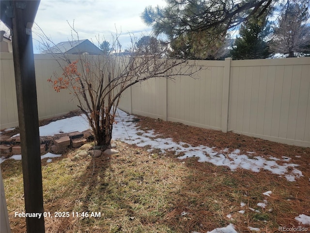 view of yard with fence