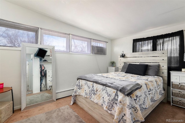 1654 S Perry St, Denver, CO 80219 - bedroom with baseboard heating, carpet floors, vaulted ceiling, and a closet