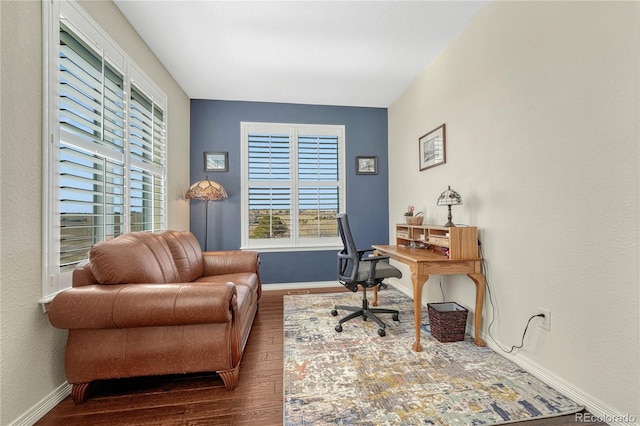 office with wood finished floors and baseboards