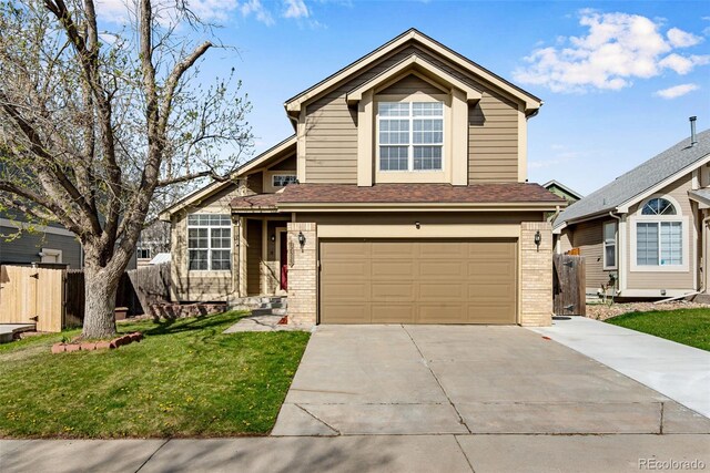 12535 Forest View St, Broomfield, CO 80020 - traditional home featuring fence, an attached garage, driveway, and brick siding