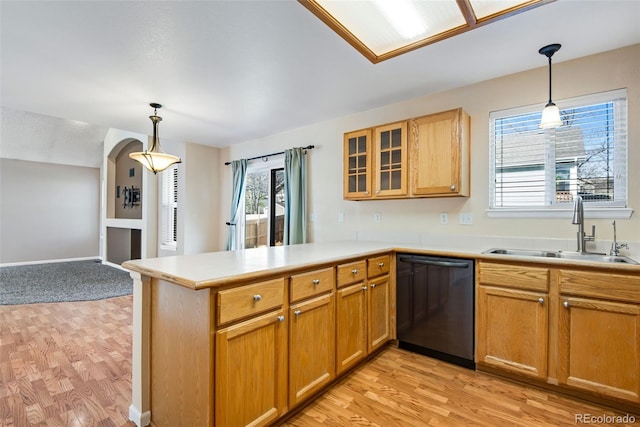 12535 Forest View St, Broomfield, CO 80020 - kitchen with dishwashing machine, light wood-style floors, a peninsula, and a sink