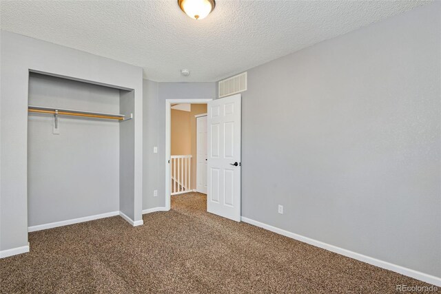 12535 Forest View St, Broomfield, CO 80020 - unfurnished bedroom featuring baseboards, carpet, a closet, and visible vents