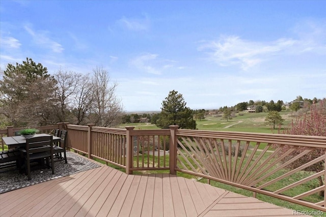 deck with outdoor dining area
