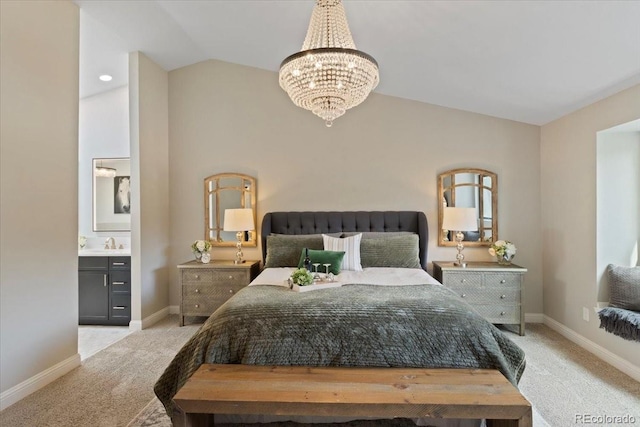bedroom featuring baseboards, a chandelier, a sink, carpet, and vaulted ceiling