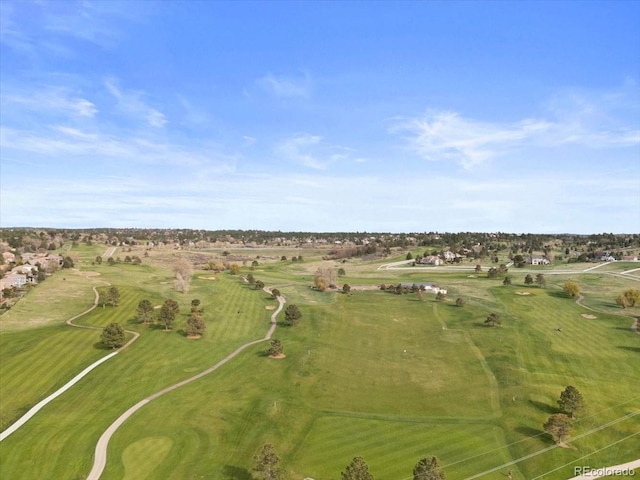 bird's eye view with view of golf course