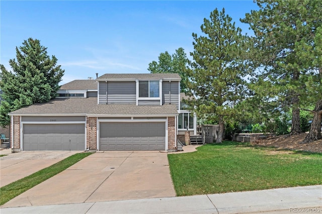 3871 E Euclid Ave, Centennial, CO 80121 - view of front of property with concrete driveway, a front yard, brick siding, and roof with shingles