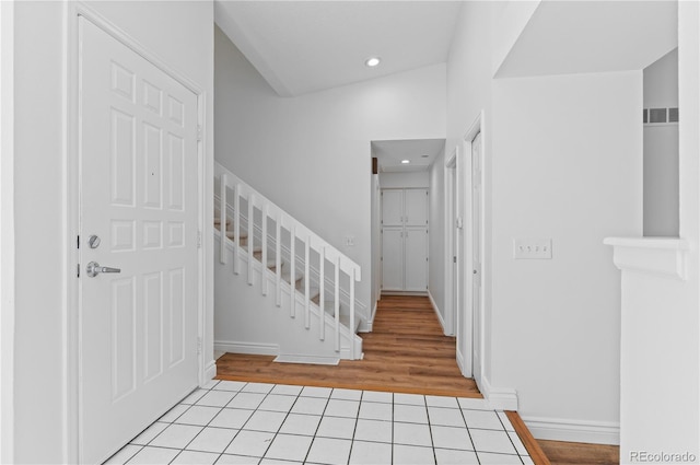 3871 E Euclid Ave, Centennial, CO 80121 - foyer entrance with light tile patterned floors, recessed lighting, and stairway