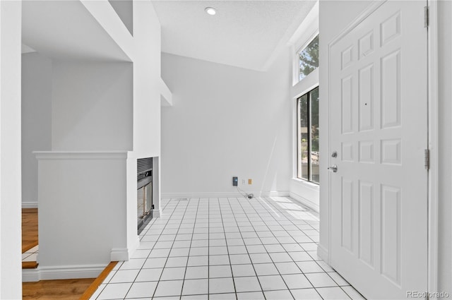 3871 E Euclid Ave, Centennial, CO 80121 - foyer featuring a glass covered fireplace and recessed lighting