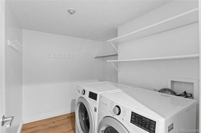 3871 E Euclid Ave, Centennial, CO 80121 - laundry area with washing machine and clothes dryer and light wood-style floors