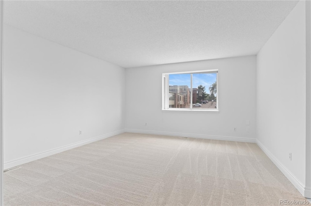 3871 E Euclid Ave, Centennial, CO 80121 - carpeted spare room with baseboards and a textured ceiling