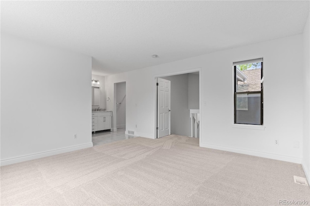 3871 E Euclid Ave, Centennial, CO 80121 - unfurnished room featuring light carpet and baseboards