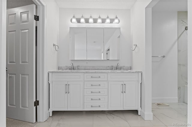 3871 E Euclid Ave, Centennial, CO 80121 - bathroom with marble finish flooring, double vanity, and a marble finish shower