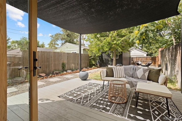 exterior space featuring a fenced backyard and an outdoor living space