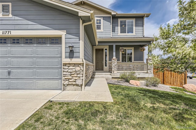 11771 W Quarles Ave, Littleton, CO 80127 - view of front of house with a porch and stone siding