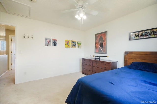 bedroom with light carpet and ceiling fan