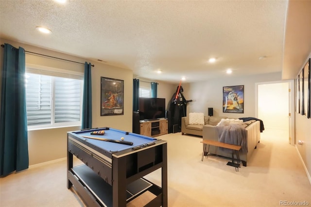 playroom with pool table, baseboards, light colored carpet, recessed lighting, and a textured ceiling