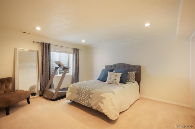 bedroom featuring visible vents, recessed lighting, baseboards, and carpet