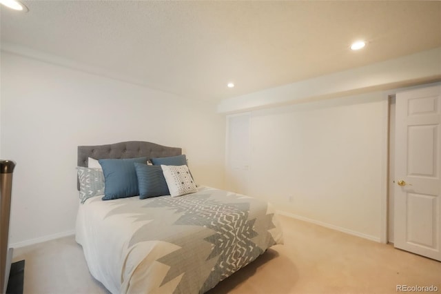 bedroom featuring carpet flooring, recessed lighting, and baseboards