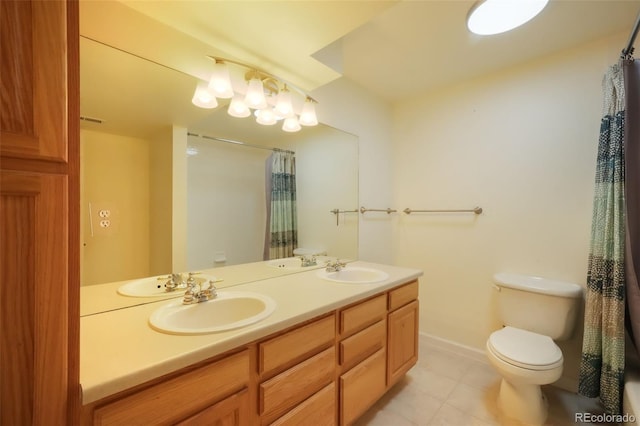 full bath featuring a sink, toilet, and double vanity