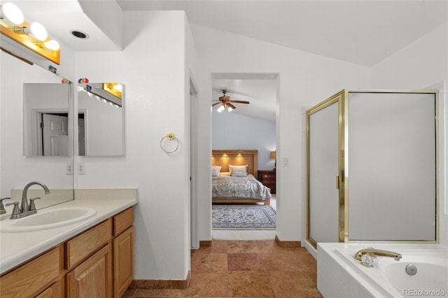 408 Sylvestor Trl, Highlands Ranch, CO 80129 - bathroom with lofted ceiling, vanity, connected bathroom, ceiling fan, and a stall shower