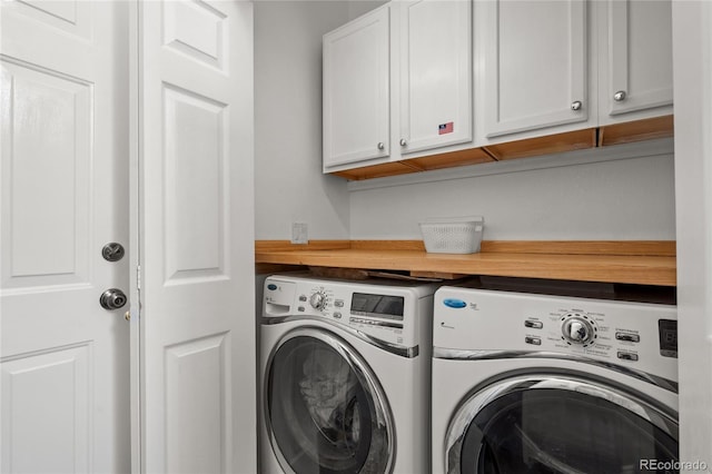 408 Sylvestor Trl, Highlands Ranch, CO 80129 - laundry room featuring washer and clothes dryer and cabinet space