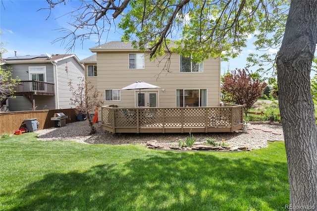 408 Sylvestor Trl, Highlands Ranch, CO 80129 - back of property featuring a wooden deck and french doors