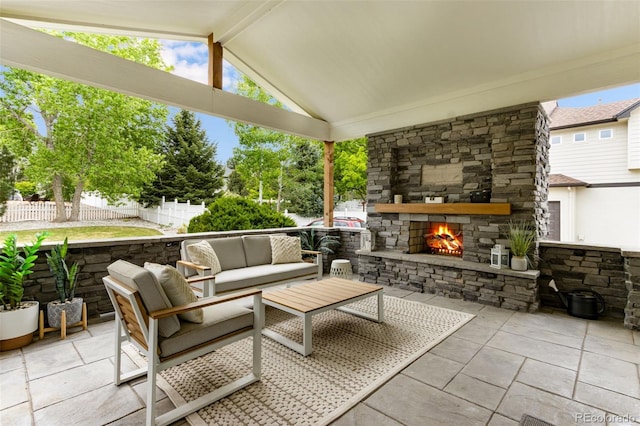 1311 Fletcher Dr, Erie, CO 80516 - view of patio featuring an outdoor living space with a fireplace
