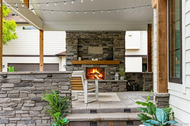 1311 Fletcher Dr, Erie, CO 80516 - view of patio with an outdoor stone fireplace