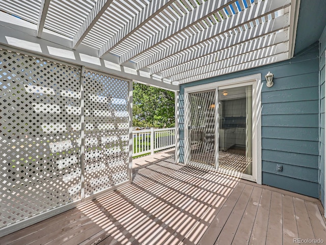 wooden deck with a pergola