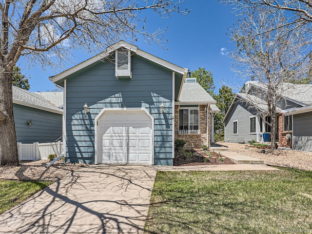 view of front facade with driveway and an attached garage