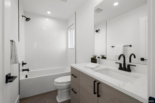 bathroom with toilet, vanity, tub / shower combination, and recessed lighting