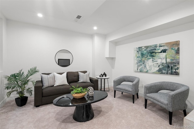 living room with carpet flooring, recessed lighting, and baseboards
