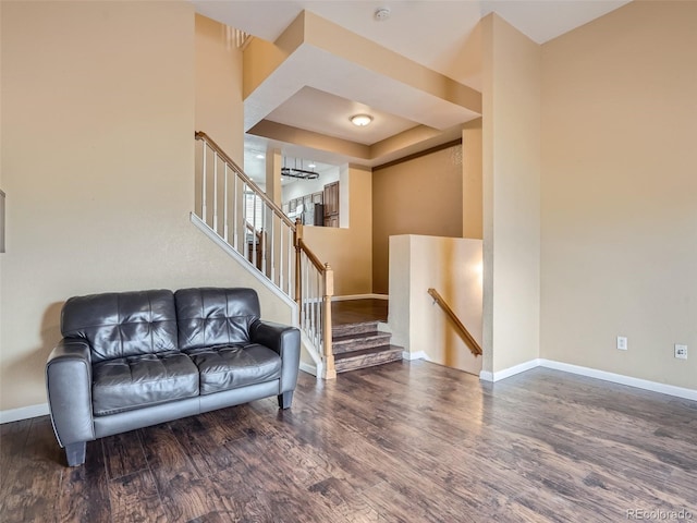 living room with dark hardwood / wood-style floors