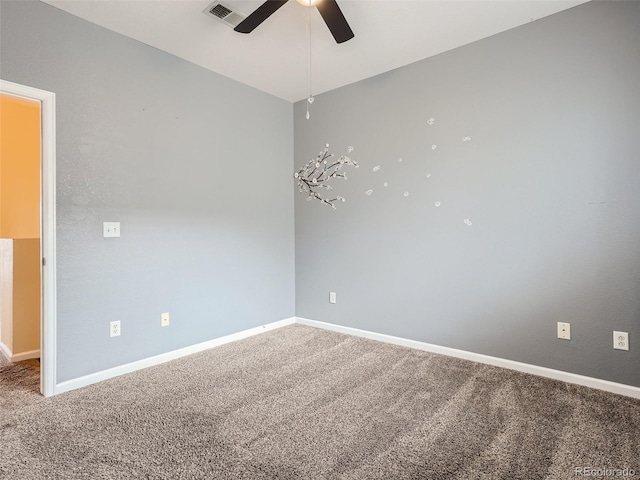 carpeted empty room with ceiling fan