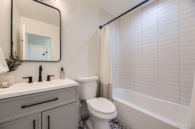 full bathroom featuring vanity, shower / bath combination with curtain, and toilet