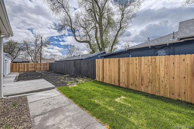 view of yard featuring a fenced backyard