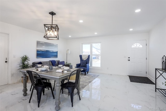 dining room with marble finish floor, baseboards, and recessed lighting